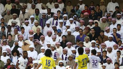 The crowd watch the Al Ain match at Hazza bin Zayed Stadium. Pawan Singh / The National