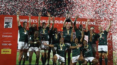 South Africa celebrate on the podium after winning the 2017 Dubai Rugby Sevens on Saturday. Francois Nel / Getty Images