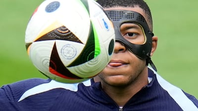 France's Kylian Mbappe controls the ball during a training session. AP