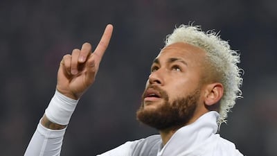 Paris Saint-Germain's Brazilian forward Neymar celebrates after scoring a second goal against Lille for PSG at the Pierre-Mauroy Stadium. AFP