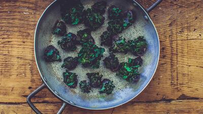 Kalettes resemble baby cabbages, but with delicate, kale-like leaves. Photo by Scott Price