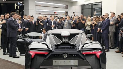 W Motors boss Ralph Debbas speaks about the Fenyr SuperSport during the opening of W Motors' boutique at the City Walk, Dubai. Pawan Singh / The National