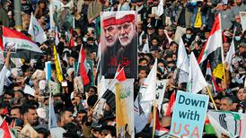 Supporters of the Popular Mobilisation Forces gather to mark the anniversary of the killing of Iranian military Qassem Suleimani and Iraqi militia leader Abu Mahdi Al Muhandis. Reuters