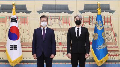 South Korean President Moon Jae-in with Suga. EPA