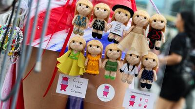 Swift memorabilia on sale outside the stadium. Getty Images