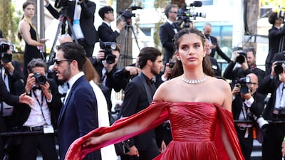 Portuguese model Sara Sampaio wears red Zuhair Murad to the screening of 'Decision to Leave' on May 23. Getty Images