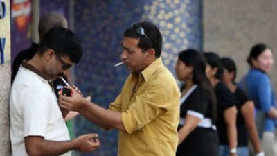 Under the new law patrons at internet cafes, billiard halls and electronic games centres will have to head outside for a cigarette.