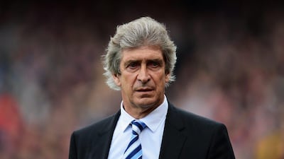 Manchester City manager Manuel Pellegrini looks on during his side's win over Crystal Palace on Sunday. Jamie McDonald / Getty Images / April 27, 2014