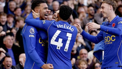 Morgan Rogers celebrates scoring with Chelsea teammates. EPA