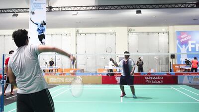 Badminton inside Saeed Hall at the Dubai World Trade Centre in Dubai. Lee Hoagland / The National