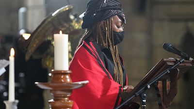 Nyaniso Tutu-Burris, Tutu's granddaughter, reads a verse from the Bible. AFP