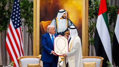 President Sheikh Mohamed presents the Order of Zayed to US President Donald Trump during a state visit reception at Qasr Al Watan. Photo: UAE Presidential Court