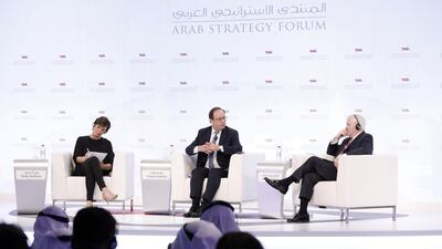Former French president François Hollande and former US Secretary of Defence Robert Gates speak during a debate at the Arab Strategy Forum in Dubai. Courtesy: Arab Strategy Forum