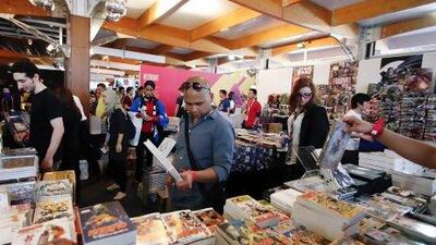 Crowds browse the huge variety of comics and books for sale at the Middle East Film and Comic Con in Dubai, April 5, 2013. Sarah Dea/The National