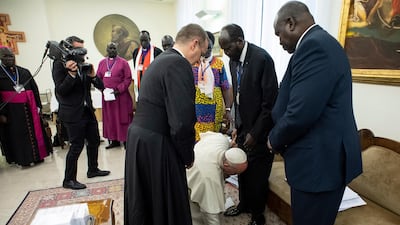Pope Francis has closed a two-day retreat with South Sudan authorities at the Vatican with an unprecedented act of respect, kneeling down and kissing the feet of the African leaders. Vatican Media via AP