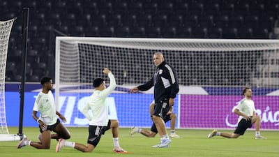 UAE head coach Cosmin Olaroiu oversees training