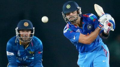 Virat Kohli bats as Kumar Sangakkara keeps wickets during the final of the 2014 ICC World Twenty20 between India and Sri Lanka in Dhaka. Getty Images