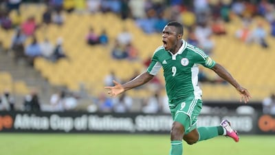 Emmanuel Emenike celebrates scoring a goal at the 2013 Africa Cup of Nations. Lefty Shivambu / Gallo Images / Getty Images