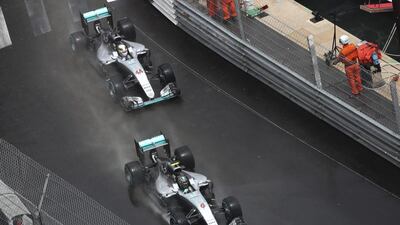 Mercedes drivers Lewis Hamilton, left, and Nico Rosberg at the Monaco Grand Prix in May. Valery Hache / AFP