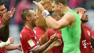 Bayern Munich's Manuel Neuer, right, and Rafinha celebrate their win on Saturday in the Bundesliga. Tobias Hase / EPA / September 17, 2016