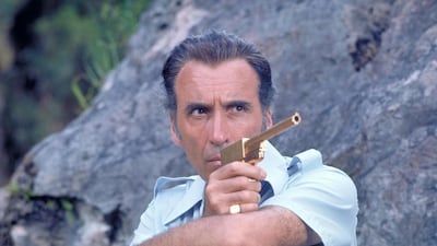 Francisco Scaramanga, Cuban-British, played by Christopher Lee in ‘The Man with The Golden Gun’ (1974). With his flying car, golden gun and laser cannon, Scaramanga is a match for Q on the novelty weapon front, but he’s no match for Bond, who dispenses with his foe in the iconic, Bruce Leeinspired, hall of mirrors finale. Courtesy United Artists