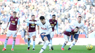 Spurs striker Son Heung-Min sees his penalty saved by Villa goalkeeper Pepe Reina, only to bundle home the rebound. Getty