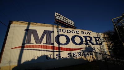 A banner promoting Republican Senatorial candidate Roy Moore is pictured on the side of a building in Birmingham, Alabama, US, on December 10, 2017. Carlo Allegri / Reuters