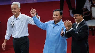Indonesian presidential candidates, from left, Ganjar Pranowo, Prabowo Subianto and Anies Baswedan, after the first presidential election debate in Jakarta in December. AFP