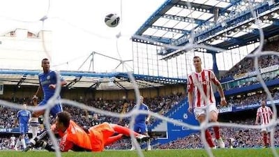 Chelsea's Ashley Cole, in blue, scored five minutes from time.
