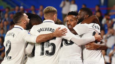 Eder Militao celebrates with teammates after scoring Real Madrid's first goal against Getafe. Getty