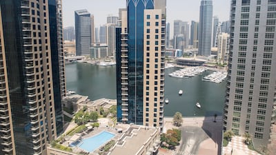 The UAE property market is expected to perform in a healthy way next year due to government measures and the Covid vaccination programme. Antonie Robertson / The National