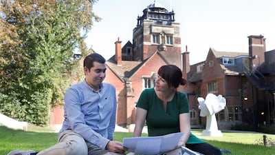 Dr Miriam Wagner and research fellow Mohamed Ahmed review copies of Arabic-language letters that were seized by the Royal Navy. Stephen Lock for The National
