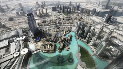 Downtown Dubai and the Dubai Mall fountains from the observation deck in the Burj Khalifa. Properties in this area are sought after and expensive. Sarah Dea / The National *** Local Caption *** SDEA120513-STOCKBurjKhalifa11.JPG