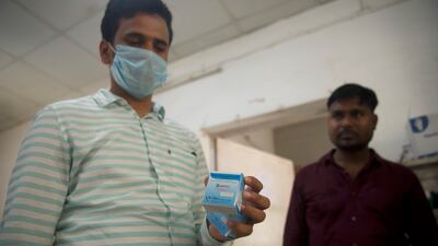 A doctor at Purnea Government Medical College and Hospital with an anti-venom given to snakebite victims in an emergency. Staff treat an average of 15 cases each day