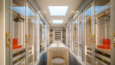 The walk-in wardrobe is the size of a boutique.