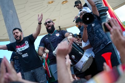 Iraqi fans use drums and a megaphone to create a celebratory atmosphere in Boston. Joshua Longmore / The National