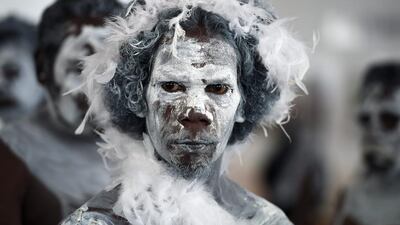 Aboriginal dancers prepare for the event Arms Against Domestic Violence at Parliament House in Canberra. Mick Tsikas / EPA