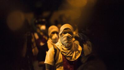 Venezuelan demonstrators protest during demonstration of opposition to the Venezuelan government n Caracas, Venezuela, February 16, 2014. Santi Donaire / EPA