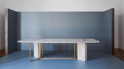 Meridiani’s Plinto table in Calacatta marble, with a bronzed brass frame. Courtesy Meridiani