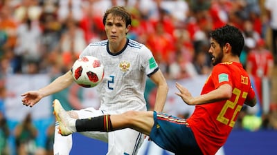 Russia's right-back Mario Fernandes in action with Spain's Isco. The Brazilian-born defender says Russia's last-16 penalty shoot-out victory over the Spaniards is 'my best moment in football. Kai Pfaffenbach / Reuters