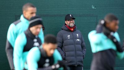 Liverpool manager Jurgen Klopp oversees the training session on Monday. PA