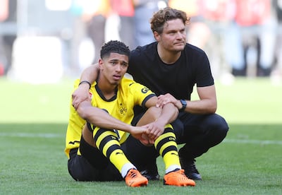 Jude Bellingham and Edin Terzic, coach of Borussia Dortmund, after their draw with Mainz at Signal Iduna Park that ended their title hopes. Getty