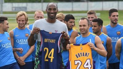 LA Lakers star Kobe Bryant shown with Barcelona footballers during a meeting in Southern California in July. Mark Ralston / AFP / July 20, 2015