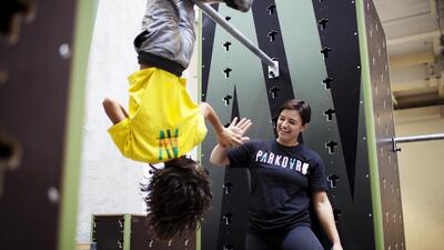 Zia Zahine, a 9-year-old home-schooled student is coached by Andrea Brooks in a Parkour workshop on December 8, 2016, in Dubai. Anna Nielsen for The National