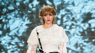 In an unusual collection to highlight violence against women, designer Yuhan Wang paired fragile lace with faux gun holsters