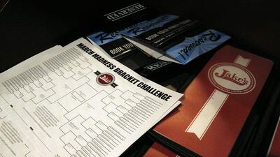 The NCAA tournament features 68 college basketball teams in the US advancing through single-elimination knockout rounds. It starts on Thursday March 20, 2014. Brennan Linsley / AP