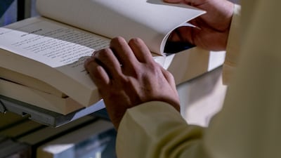 To attend the Al Ain Book Fair, an electronic access card must be obtained, either through the website or the Abu Dhabi International Book Fair smartphone app