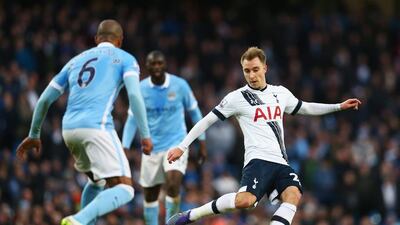 Christian Eriksen, right, of Tottenham Hotspur passes during their Premier League match against Manchester City at Etihad Stadium on February 14, 2016 in Manchester, England. (Photo by Clive Brunskill/Getty Images)
