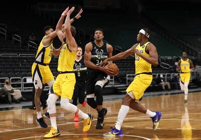 Milwaukee Bucks forward Giannis Antetokounmpo drives to the basket against Indiana Pacers. Reuters