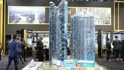 Above, a model of the Aykon City project by Damac. Pawan Singh / The National